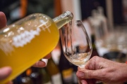 Tyler Kavanagh pours wine at Biondivino, a wine shop on Russian Hill. Biondivino hosted a wine tasting on Tuesday, Nov. 19, 2019 in San Francisco, Calif.