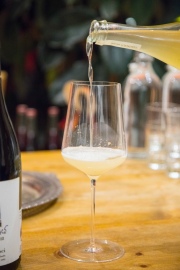Tyler Kavanagh pours  a Costadilà Bianco, a fermented sparkling wine, at Biondivino wine shop on Russian Hill. Biondivino hosted a wine tasting on Tuesday, Nov. 19, 2019 in San Francisco, Calif.