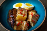 Braised pork belly, bamboo shoots and egg is one of the menu items included with dinner kits at  Claws of Mantis, a pop-up restaurant located in Japantown in San Francisco, Calif.