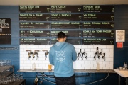 Adam Lustig pours a beeer at Humble Sea Brewery in Santa Cruz.