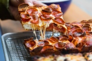 The 5x5 is a deep dish pepporoni pizza at Square Pie Guys in San Francisco, Calif. Square Pie Guys is a new Detroit-style pizza shop in SoMa owned by Marc Schechter and Danny Stoller.